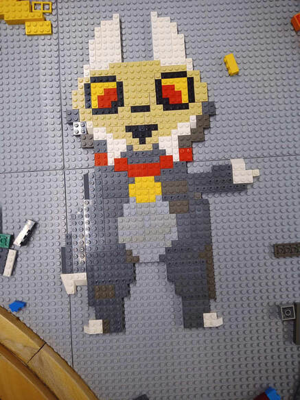 Lego portrait of the character King from the TV show Owl House.